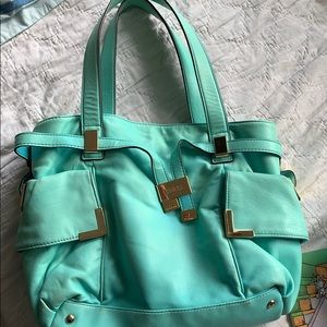 Michael Kors turquoise leather bag.